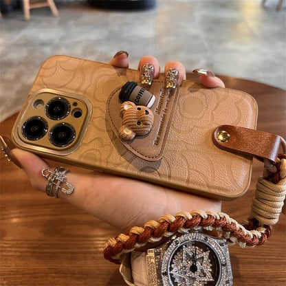 Latte Brown Leather iPhone Case: Floral Kickstand, Bear Charm & Rope Strap